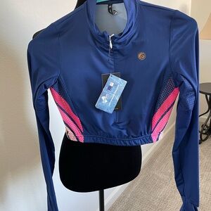 Light weight running long sleeved crop top. Tri Sirena. New + tags. Size Medium
